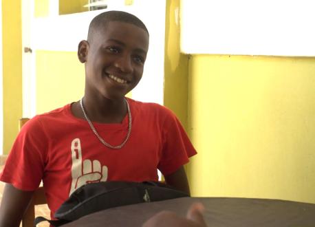 Peterson, 15, lost an arm in Haiti's 2010 earthquake and lived through a second major quake in 2021. He receives counseling, nutritious meal and skill training at a UNICEF-supported IDEJEN center in Les Cayes. 