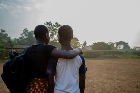 Young Adults with Arms Around Eachother