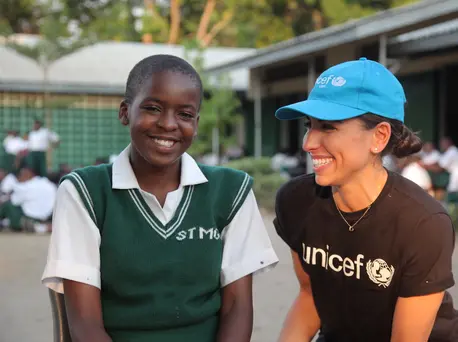 K.I.N.D. Fund scholarship student Isroella, 14, and Nina Marie Costa, UNICEF USA Deputy Director of Public Relations, at St. Monica Secondary School in southern Malawi. K.I.N.D. Fund scholarship student Isroella, 14, and Nina Marie Costa, UNICEF USA Deputy Director of Public Relations, at St. Monica Secondary School in southern Malawi.
