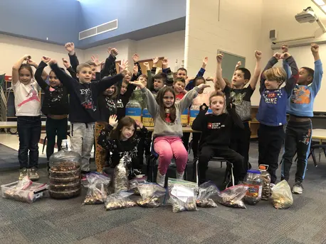Group of Children with Arms Raised
