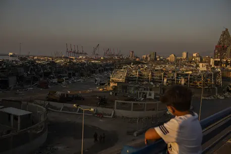 Boy Overlooking City