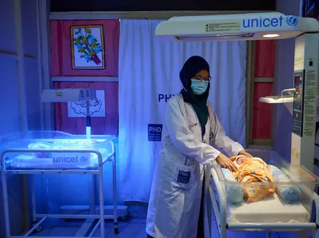 A newborn undergoes phototherapy at a UNICEF-supported primary health care center in a Rohingya refugee camp in Bangladesh. A newborn undergoes phototherapy at a UNICEF-supported primary health care center in a Rohingya refugee camp in Bangladesh.