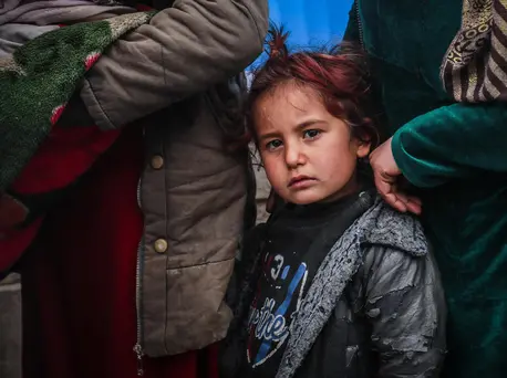 Internally displaced children and families line up for UNICEF emergency assistance in Hasakeh city, northeast Syria, on January 27, 2022. Internally displaced children and families line up for UNICEF emergency assistance in Hasakeh city, northeast Syria, on January 27, 2022.
