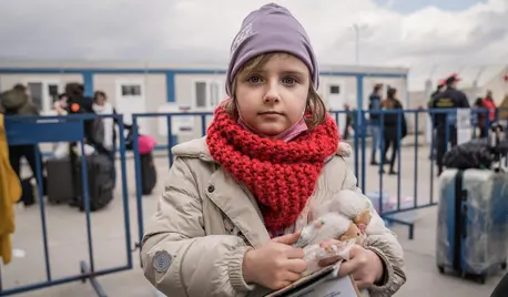 Alisa, 8, who fled Ukraine with her mother Vlada, photographed at a transit stop in Romania on March 4, 2022. Alisa, 8, who fled Ukraine with her mother Vlada, photographed at a transit stop in Romania on March 4, 2022.