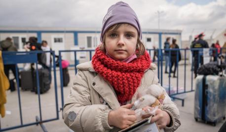 Alisa, 8, who fled Ukraine with her mother Vlada, photographed at a transit stop in Romania on March 4, 2022.
