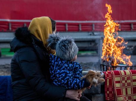 Adult and Child Observing Fire