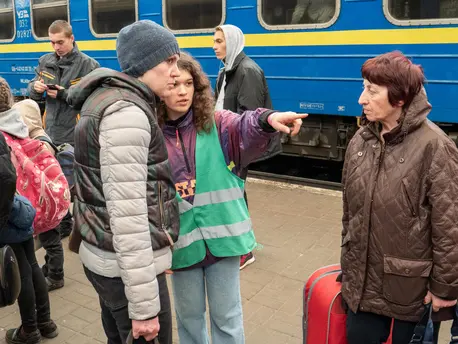 Girl Giving Adults Directions