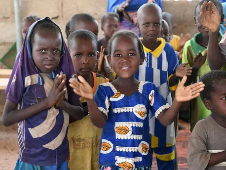 Children play together at a UNICEF Child Friendly Space in Wedbare, in the north central region of Burkina Faso, in May 2022.