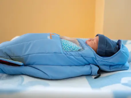 Born one month early in northeastern Ukraine, baby Sofia sleeps peacefully in a portable incubator at the Sumy Regional Perinatal Center. Born one month early in northeastern Ukraine, baby Sofia sleeps peacefully in a portable incubator at the Sumy Regional Perinatal Center.