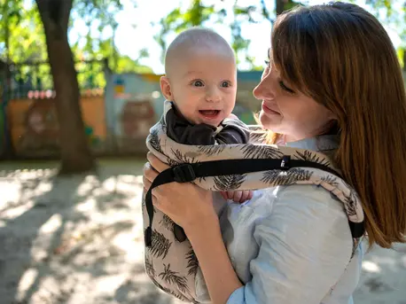 Woman Carrying Baby