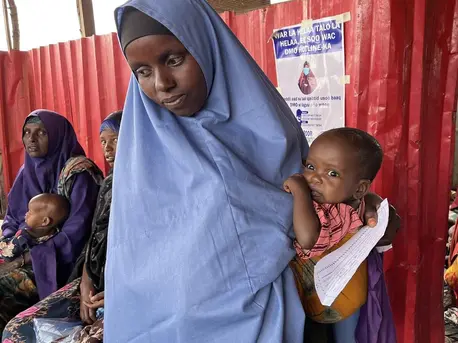 Woman Holding Baby