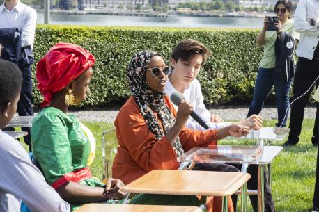 UNICEF USA National Youth Council Member and UNICEF Youth Advocate Salma Abdi, 18, center, speaks at a United Nations General Assembly 77 event in Sept. 2022.