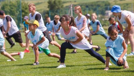 Ukrainian children and teens ranging from age 6 to 18 participating in a sports activity as part of a UNICEF-supported mental health program in western Ukraine..