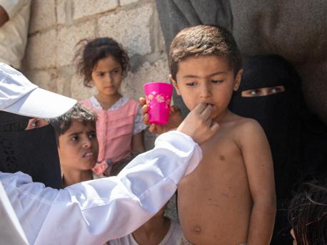 A boy gets treatment during a UNICEF-supported health screening campaign in Marib, Yemen
