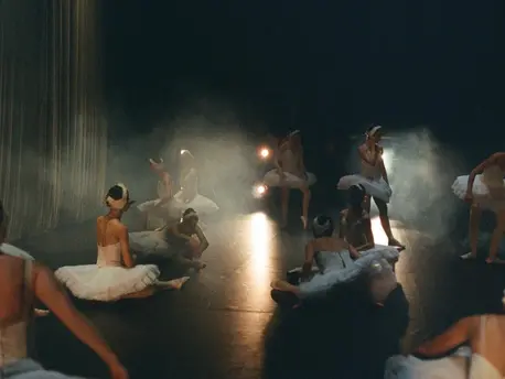 Ballet dancers from Ukraine stretch and ready themselves onstage before a performance. Ballet dancers from Ukraine stretch and ready themselves onstage before a performance.