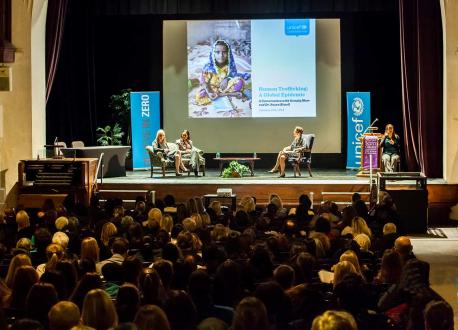 Somaly Mam, Susan Bissell, and moderator on stage at the UNICEF Speaker Series on Human Trafficking in Atlanta