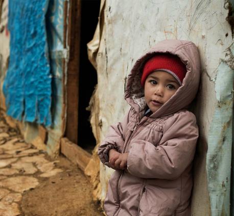 As with this young girl leaning against her ramshackle shelter UNICEF Provides winter coats and hats to thousands of children in Syrian Refugee camps - one of the countless ways UNICEF shelter and protects children around the world.