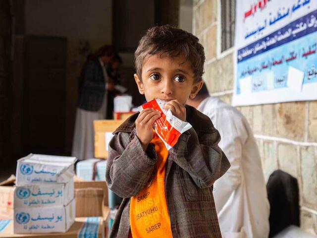 Raheb eats the Ready-to-Use Therapeutic Food