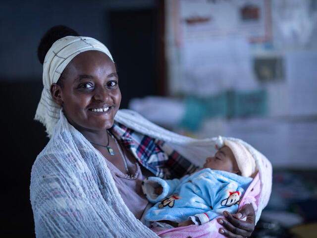 Kokobe Ashebir, 20, brings her 2-month-old baby for a routine check-up at Kolabe Bale Health Post in Sire, Oromia Region, Ethiopia. 