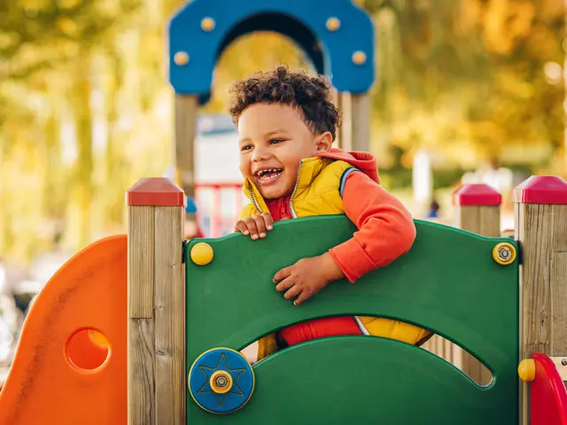 Smiling child in a playground