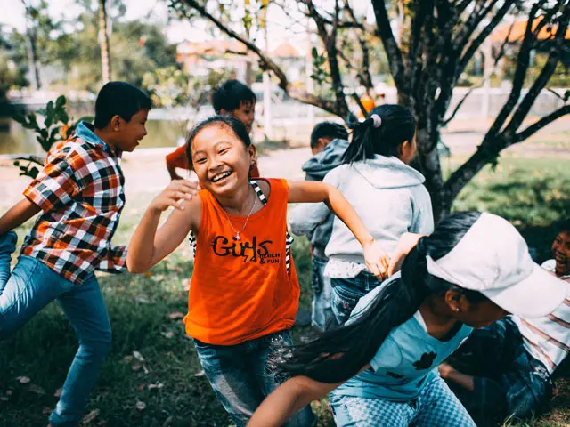 Happy children playing in a park