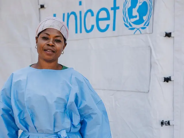 UNICEF-supported psychologist outside an Ebola Treatment Center in Bunia, DR Congo.