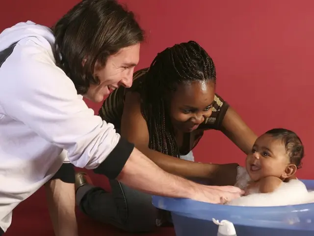 Lionel Messi with baby Lamine Yamal (in bathtub) and his mother, Sheila Ebana in 2008.