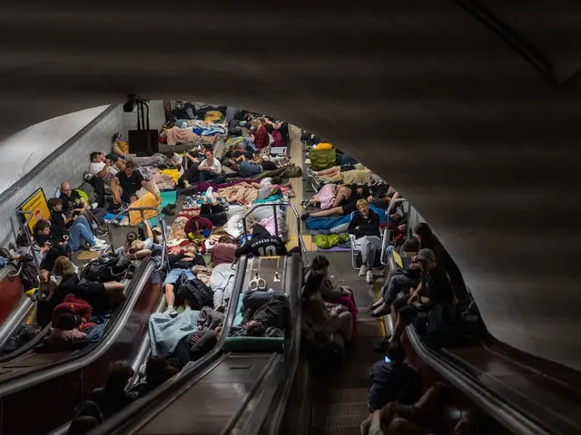Families shelter from overnight attacks inside a Kyiv metro station on July 30, 2026.