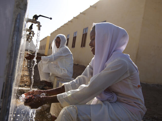 Women Washing Hands