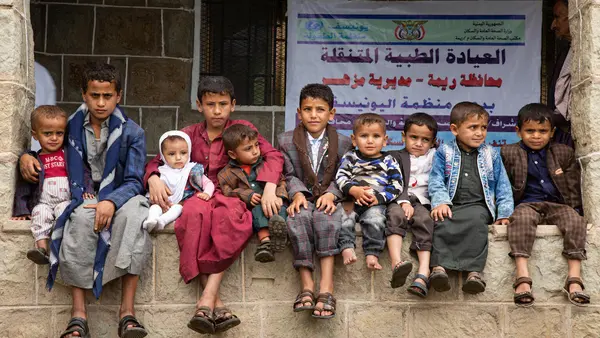 Children in Mazhar District, Raymah Governorate, Yemen, get health care services provided by a UNICEF-supported mobile clinic.