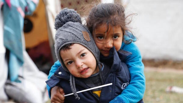 Siblings in a UNICEF-supported temporary shelter in Adıyaman, after two devastating earthquakes hit southeastern Turkey.