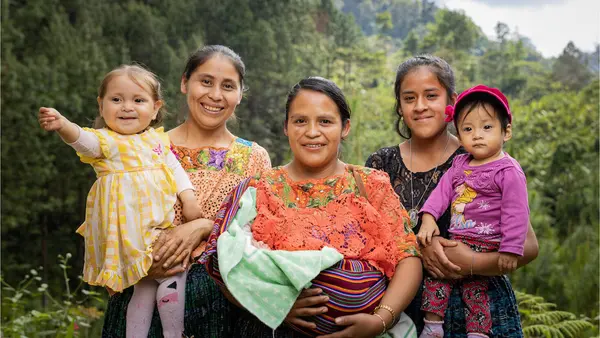 In Coban, Alta Verapaz, Guatemala, mothers hold their children, ages 0 to 3. 