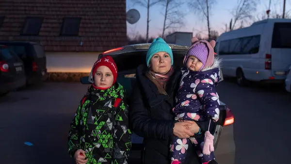 A mother with her two children describes fleeing their home in Kharkiv to escape the war in Ukraine.