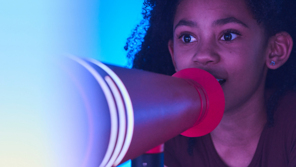 A girl attends Heart Strings, a multi-sensory exhibit that teaches visitors about the impact of  UNICEF's work for children. 