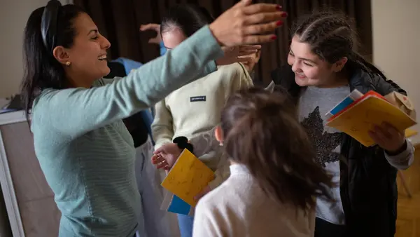 A group session for refugee adolescents and parents in Armenia. 