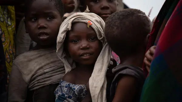 On June 1, 2024, children gather at the Bulengo site for internally displaced people in Goma, eastern Democratic Republic of the Congo.