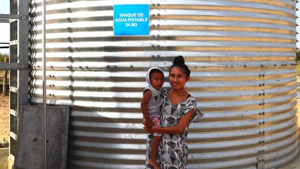 Estefany, a young mother of two in rural La Guajira, Colombia, works as a plumber in her village's locally managed, sustainable water treatment plant, built by UNICEF and partners.