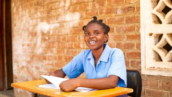Kids in Need of Desks (K.I.N.D.) scholarship recipient Chisomo Daimon in Malawi. 