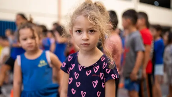 Mariam, 3, displaced by conflict, is staying with her family in a shelter in Beirut. 