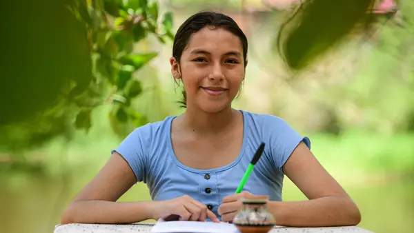 Susan, 16, of Peru's Ucayali region, writes a "Dear adults" letter as part of UNICEF's campaign for World Children's Day 2024.