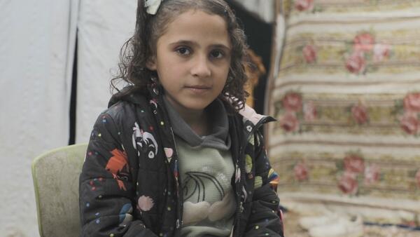 In Gaza, Qamar, 7, lives in a tent with her mother, battling physical and emotional trauma after losing her leg. She is one of thousands of children who have suffered conflict-related injuries in Gaza in the last year and are now facing lifelong disabilities.