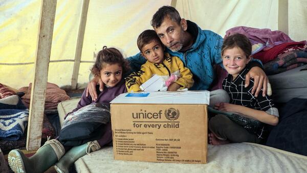 UNICEF and partners bring warmth to children in Khan Younis, Gaza Strip by distributing winter clothes to families in Algeria Camp and Al Amal Camp.