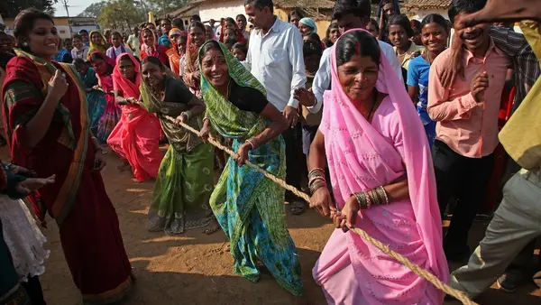  TOP PHOTO: Villagers from Mathaldbri village, India participate in a community sports day that was organized by volunteers in the UNICEF funded Messengers of Knowledge program.
