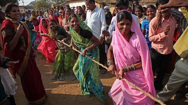  TOP PHOTO: Villagers from Mathaldbri village, India participate in a community sports day that was organized by volunteers in the UNICEF funded Messengers of Knowledge program.