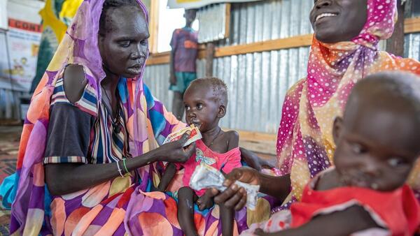 On July 29, 2024, a severely malnourished child is fed ready-to-use therapeutic food at the UNICEF-supported Payuer Nutrition Center in Renk county, South Sudan.