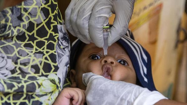 On 5 April 2025, a child receives polio drops at Saudi Hospital in Omdurman, Khartoum State, Sudan. 