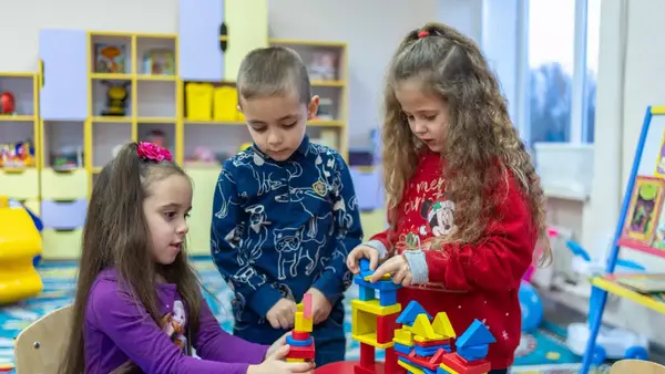 Young children play in a UNICEF-supported developmental class in the village of Petropil, Zaporizhzhia oblast, Ukraine. 