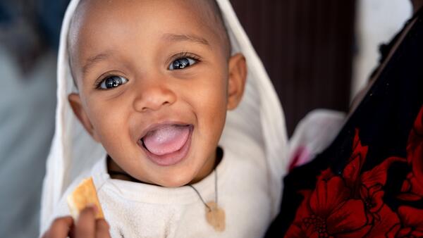 A 1-year-old baby receives services at a UNICEF-supported health center in Amhara region of Ethiopia in December 2024.