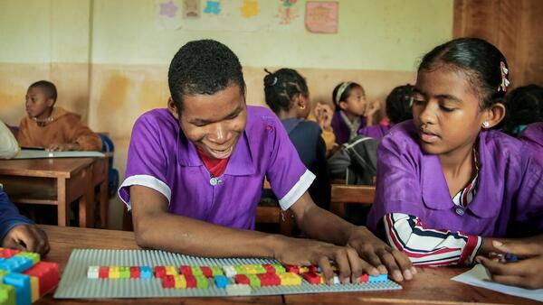 Students work with LEGO Braille Bricks in a UNICEF-supported schoo lin Madagascar.