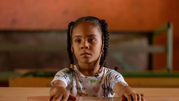 Fatima, 6, sits in an empty classroom at the UNICEF supported Alshargia safe learning space or Makanna in Kassala state, Sudan.